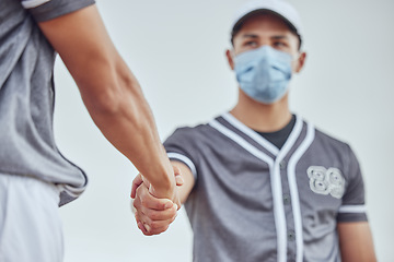 Image showing Baseball player, hands and together for covid with mask, respect or game for win, pandemic or coronavirus. Man, sports and handshake in ppe for safety at baseball match, contest or field in New York