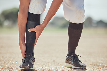 Image showing Sports, field and man with ankle injury after game, competition or baseball performance workout. Emergency, training accident or athlete legs in pain after fitness, exercise or running on grass pitch