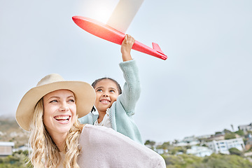 Image showing Happy, mother and Girl with airplane toy on travel vacation seaside for fun activity with adoption. Smile, woman and kid on tropical family holiday in costa rica with daughter and mom enjoy playing