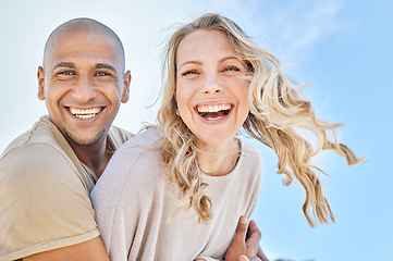 Image showing Love, blue sky and diversity couple hug, laugh and enjoy fun quality time together on travel vacation date. Happy, smile and romantic black man, woman or excited people bond on Toronto Canada holiday