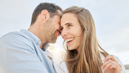 Image showing Love, happy and vacation with a couple on a date, bonding during summer while laughing or joking together. Sky, travel and smile with a man and woman enjoying a romantic holiday outside in the day