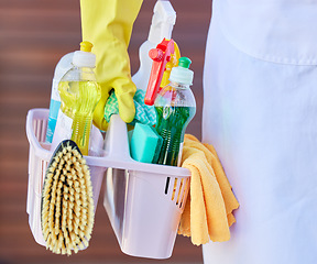 Image showing Cleaning, tools and cleaner carrying basket with liquid soap, brush and detergent spray bottle. Closeup of products for washing, hygiene and clean supplies for housekeeper, maid or domestic worker