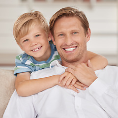 Image showing Family, love and portrait of father with son sitting on the sofa, smile of faces. Happiness, affection and child bonding with single dad in family home hugging, embrace and relax together on couch