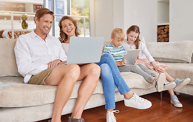 Image showing Family, kids and with digital devices have smile, together and happy in living room on couch. Children, parents and love with laptop, smartphone and bonding together in lounge on sofa with internet.