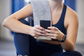 Image showing Fitness, smartphone or relax body of woman typing, scroll or browse health app, wellness blog post or social media gym feed. Girl hands of digital mobile user search web for training workout exercise