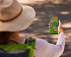 Image showing Internet map, phone and woman in nature for adventure, travel and hiking on holiday in Costa Rica. Back of person with a gps location on a mobile while walking or trekking in the mountains or forest