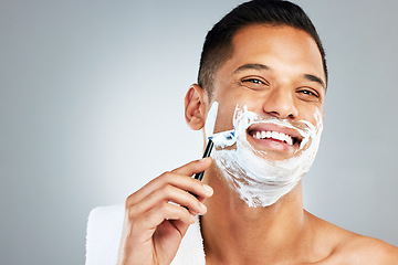 Image showing Skincare, facial and man shaving beard or face hair for cleaning cream and razor. Happy latino male shave, handsome and epilation care of skin during morning routine for beauty and hygiene wellness