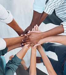 Image showing Diversity, hands and team above in support, trust and unity for collaboration, agreement or meeting at the office. Group hand of diverse people in teamwork, cooperation and solidarity for community