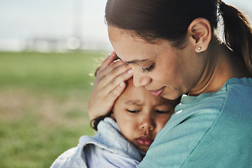 Image showing Comfort, mother and sad baby with anxiety, fear and frustrated with problems being supported and loved by mom. Family, grief and mama carrying a moody and angry girl child or kid at a park outdoors