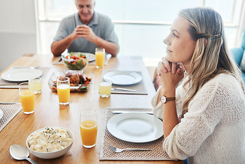 Image showing Woman, thinking at the dinner table in gratitude for food, family and home. Female sitting in thought with father in hope, spiritual and religion for grateful thanksgiving meal together