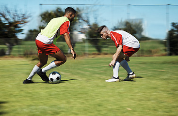 Image showing Soccer, friends and training and workout with men playing on a sports field, competitive training for sports goal. Ball, team and energy with exercise, fitness and practice outdoor football on grass