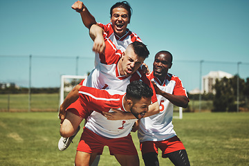 Image showing Soccer player, soccer and soccer field, winner and team, diversity and celebrate goal, athlete happy and sports win. Sport, fitness and young men celebrating, outdoor game and team spirit, piggy back