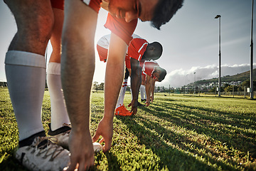 Image showing Soccer field, sports men and stretching legs on outdoor sports stadium grass for training, exercise and fitness workout. Football group athletes warm up body on pitch for competition game performance