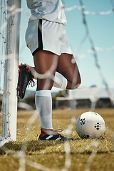 Image showing Soccer player, ball and athlete standing outdoor for training for a game on sports field practice for goal, motivation and energy. Football, fitness and athlete woman with sport skill for competition