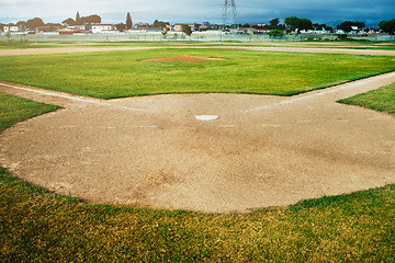 Image showing Baseball, sports and training with an empty outdoor field or grass pitch in the day ready for a game. Fitness, health and exercise with an outside venue for playing competitive sport for recreation