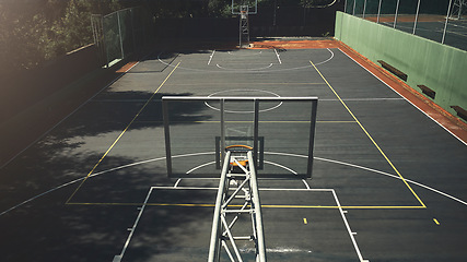 Image showing Background of basketball court, sports ground and outdoor community playground for competition, training and ball game. Aerial basketball hoop, net and floor space of urban stadium performance action