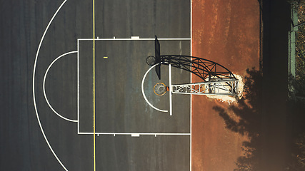 Image showing Aerial background basketball court, sports playground and outdoor community turf for competition, training and ball game. Above basketball hoop, floor space lines and urban stadium pitch in sunshine
