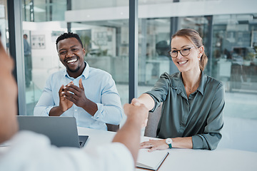 Image showing Business people, handshake and interview in celebration for recruitment, hiring and employment at the office. Happy corporate executives congratulating new employee shaking hands for company growth