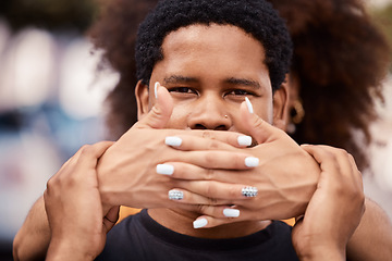 Image showing Male silence, hands and protest in city for freedom, equality or justice in the community. Shame, victim and portrait of black man with covered mouth with fear, scared or pressure at public rally