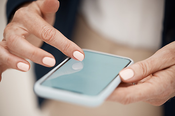 Image showing Technology, hands and senior woman with a phone networking on social media or the internet. Communication, mobile and closeup of elderly lady doing research or scrolling on website with a smartphone.