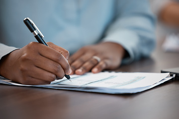 Image showing Hands, documents and contract with a black man signing paperwork at a table or desk in the office. Compliance, loan and insurance with a male putting his signature on a legal document for agreement