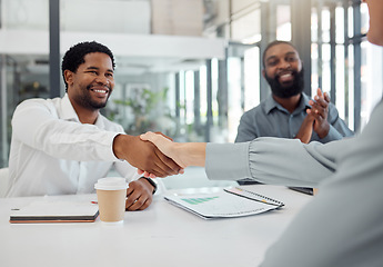 Image showing Business, handshake and meeting for deal, contract and documents in office for agreement in partnership. Shaking hands, applause or congratulations at celebration for man, seo or marketing with team