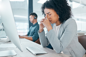 Image showing Call center, headache and worker with stress while consulting, working and thinking with burnout at telemarketing company. Sad, frustrated and customer service employee with depression working in crm