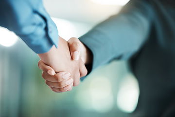 Image showing Handshake, meeting and business people in partnership, collaboration and working on a deal at work. Thank you, teamwork and workers shaking hands, giving a welcome and motivation in an office