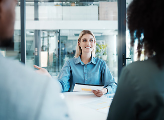 Image showing Woman, documents and meeting with client in office for planning, discussion or strategy for business. Business meeting, talking and smile at table with paper for collaboration, deal or contract