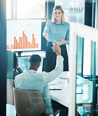 Image showing Finance, meeting and presentation with a business woman answering a question in the boardroom. Teamwork , data and information with a female employee training or coaching her team in the office