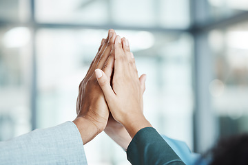 Image showing Hands, high five and motivation with a team working in collaboration together in the office. Team building, success and partnership with an employee group in celebration of reaching a target or goal