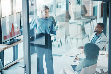 Image showing Finance, presentation and meeting with a business woman training or coaching her team in the boardroom. Marketing, strategy and data with a female mentor teaching an employee group during a workshop