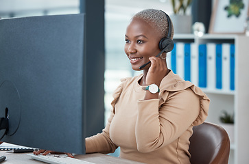 Image showing Call center, contact us and happy consultant in communication, helping and talking in customer services. Smile, telemarketing and black woman networking and speaking to a client at a support desk