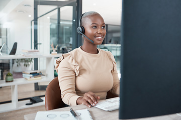 Image showing Call center agent, black woman and consulting, support or advice with headset on computer. Contact us, consultant or telemarketing, customer service operator or worker from South Africa in office.