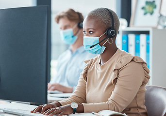 Image showing Black woman, call center and face mask for covid, headphones and phone call with client, customer service or telemarketing sales job. Contact us, consultant and tech support, health safety at work.