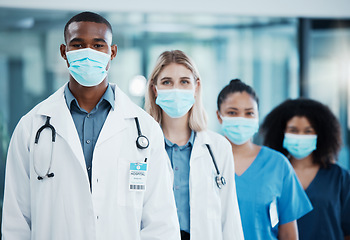 Image showing Covid, medical doctors and team working in healthcare, consulting and in collaboration together at a hospital. Group of medicine workers with face mask for safety from virus in a row at a clinic