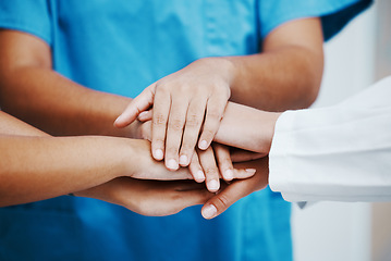 Image showing Healthcare, hands and team in support, trust or hope for unity, collaboration or cooperation at the hospital. Group hand of medical experts together in teamwork for agreement or meeting in solidarity