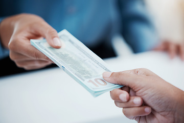 Image showing Dollar, money and cash payment with hands trading wealth over a table in a financial business or investment company. Finance, loan and trusted businessman giving a customer savings, donation or gift