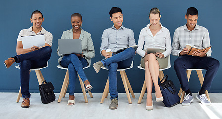 Image showing Recruitment, chair and row of people with interview preparation notes in book, laptop or tablet. Hiring, diversity and candidate group getting ready with optimistic smile for work opportunity.