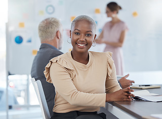 Image showing Portrait, black woman and business with smile, being confident and in meeting for planning, startup company and at desk in office. Female, girl and working with coworkers, strategy and documents.