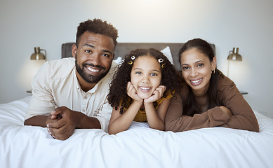 Image showing Black family bed, bonding and love of a mother, father and girl on a home bedroom together. Portrait of a happy mama, dad and child in the morning feeling happiness smile feeling care in a house
