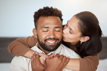 Image showing Love, black couple and kiss with hug, being happy and embrace together for marriage, anniversary and bonding. Romance, man and woman being loving, enjoy relationship and being romantic and happiness.