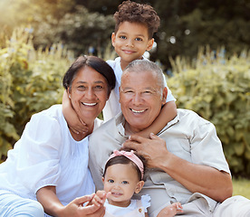 Image showing Family, portrait and children relax with grandparents in a park, happy and smile while sitting nature. Happy family, kids and senior couple in a yard or garden in Mexico, playing and embrace together