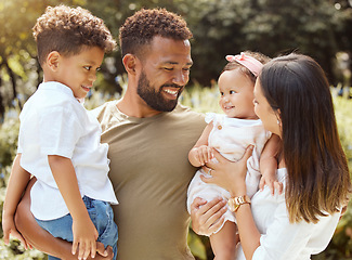 Image showing Black family, happy and nature park with people holding a child and baby outdoor. Mother, father and children together in the summer sun with happiness smile and kids spending quality time outdoors