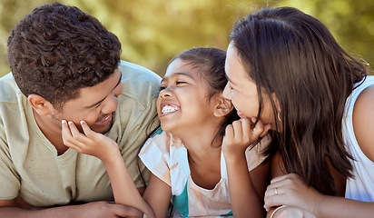 Image showing Family, bonding and love smile of a mom, dad and girl together outdoor showing happiness in nature. Happy mother, father and young child feeling happy and parents care in a summer kid park smiling