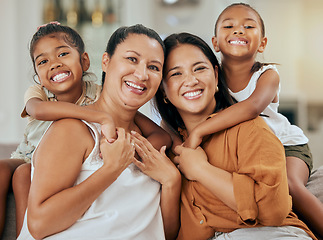 Image showing Portrait of a grandmother, mother and girl children with a smile relaxing together in their home. Happiness, love and family from Mexico sitting on a sofa in the living room of their modern house.