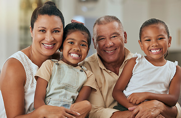 Image showing Love, portrait and family of kids and grandparents on a sofa, relax and bond in a living room together, happy and cheerful. Happy family, children and smiling seniors embrace grandchildren on a couch