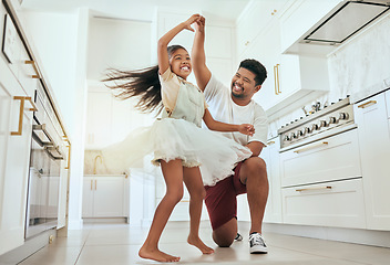 Image showing Love, dancing and father with girl in kitchen bonding, having fun and playing together. Family, affection and happiness in Indian dad with child dance, spin and relax in family home enjoying weekend