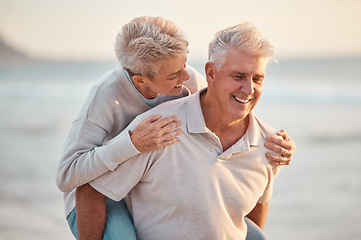 Image showing Senior couple, piggy back and beach retirement, summer vacation or sunshine holiday together in outdoor Australia nature. Happy man, smile woman and elderly people in love, romance and relax at ocean