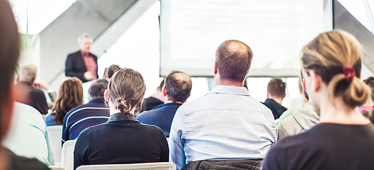 Image showing Male speeker having talk at public event.